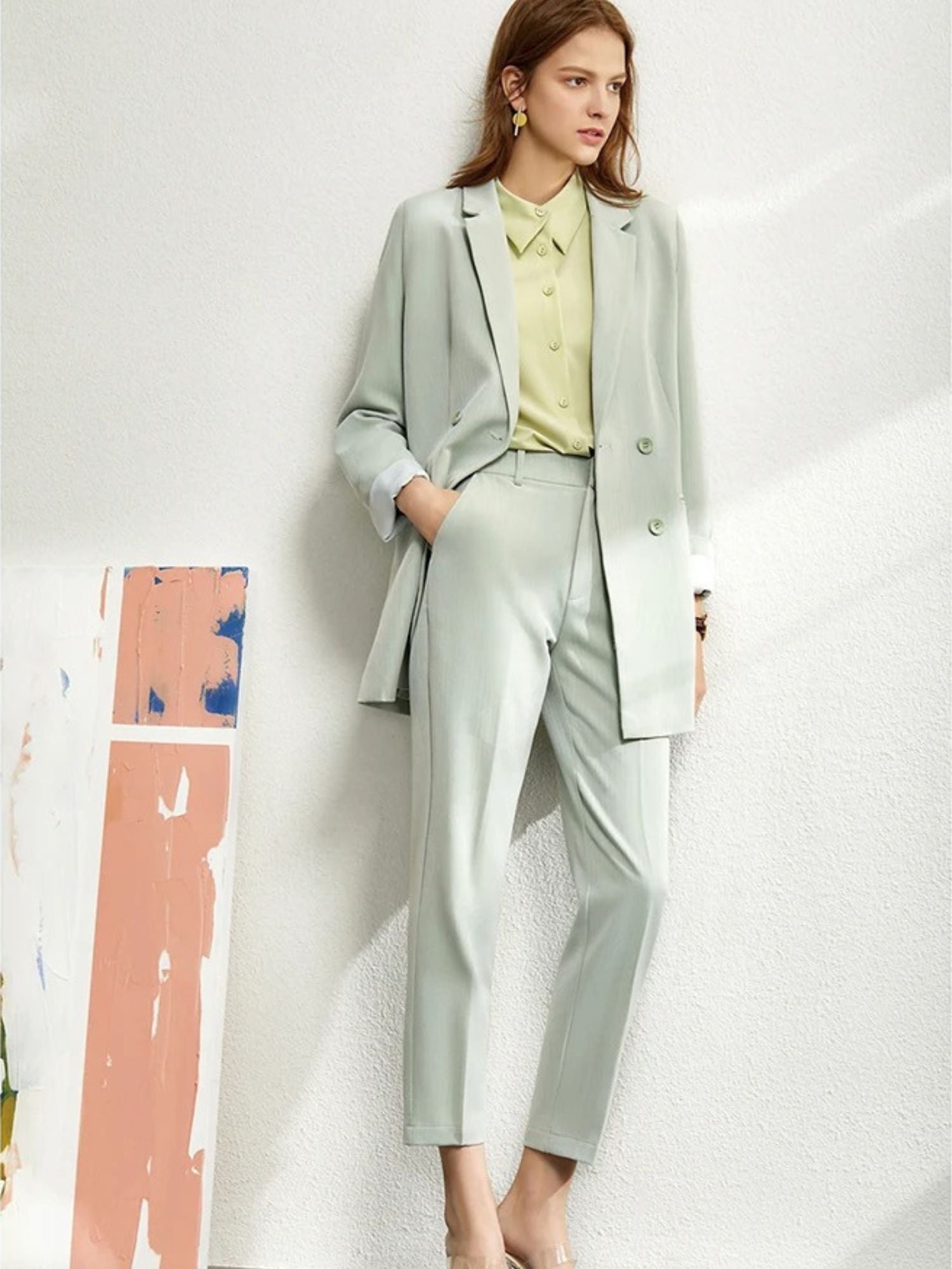 Mint green oversized blazer and matching trousers, styled with lemon blouse and heels