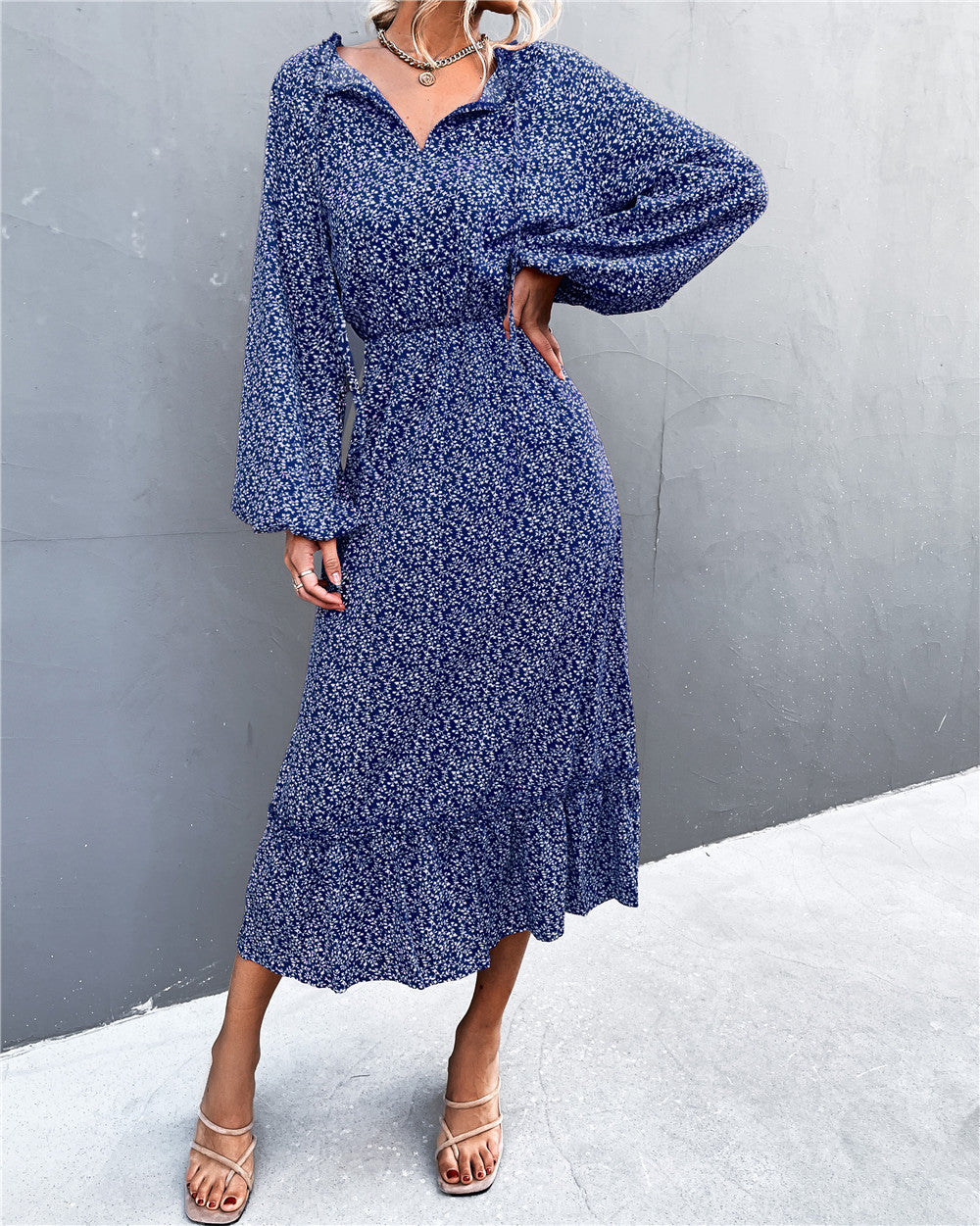 Damen Midikleid mit verspielt-floralem Design und weiten Ärmeln Sovae