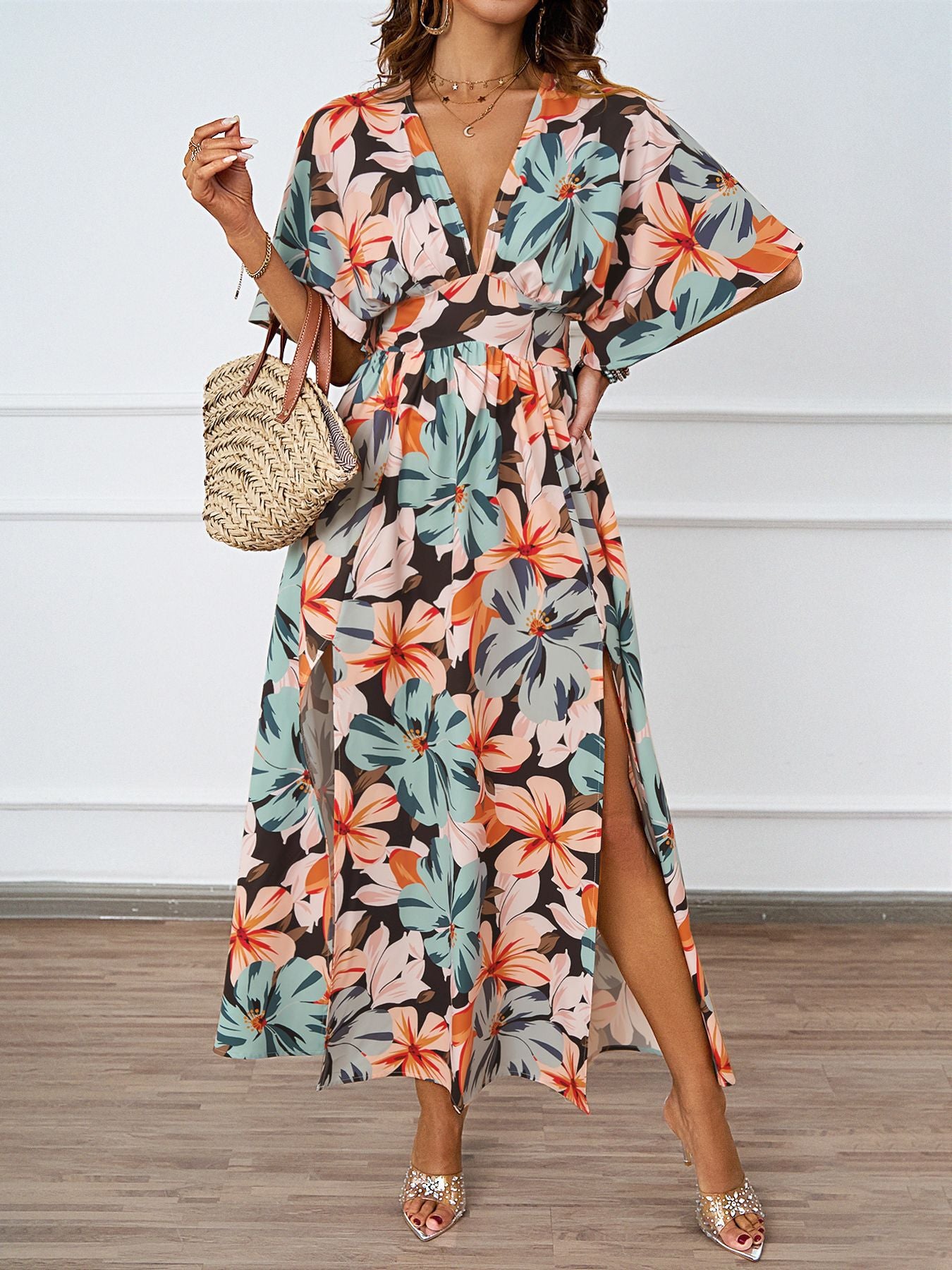 Damen florales Maxikleid mit tiefem V-Ausschnitt und Seitenschlitzen Sovae