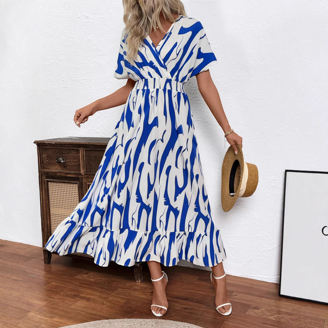 Damen Maxikleid mit V-Ausschnitt und voluminösem Saum Sovae