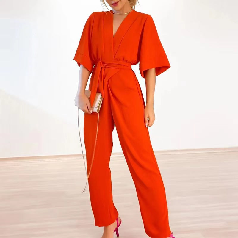Damen eleganter Jumpsuit mit tiefem V-Ausschnitt und Taillenbindung Sovae