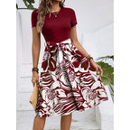 Damen Midi-Kleid mit floralem Design und tailliertem Schnitt Sovae