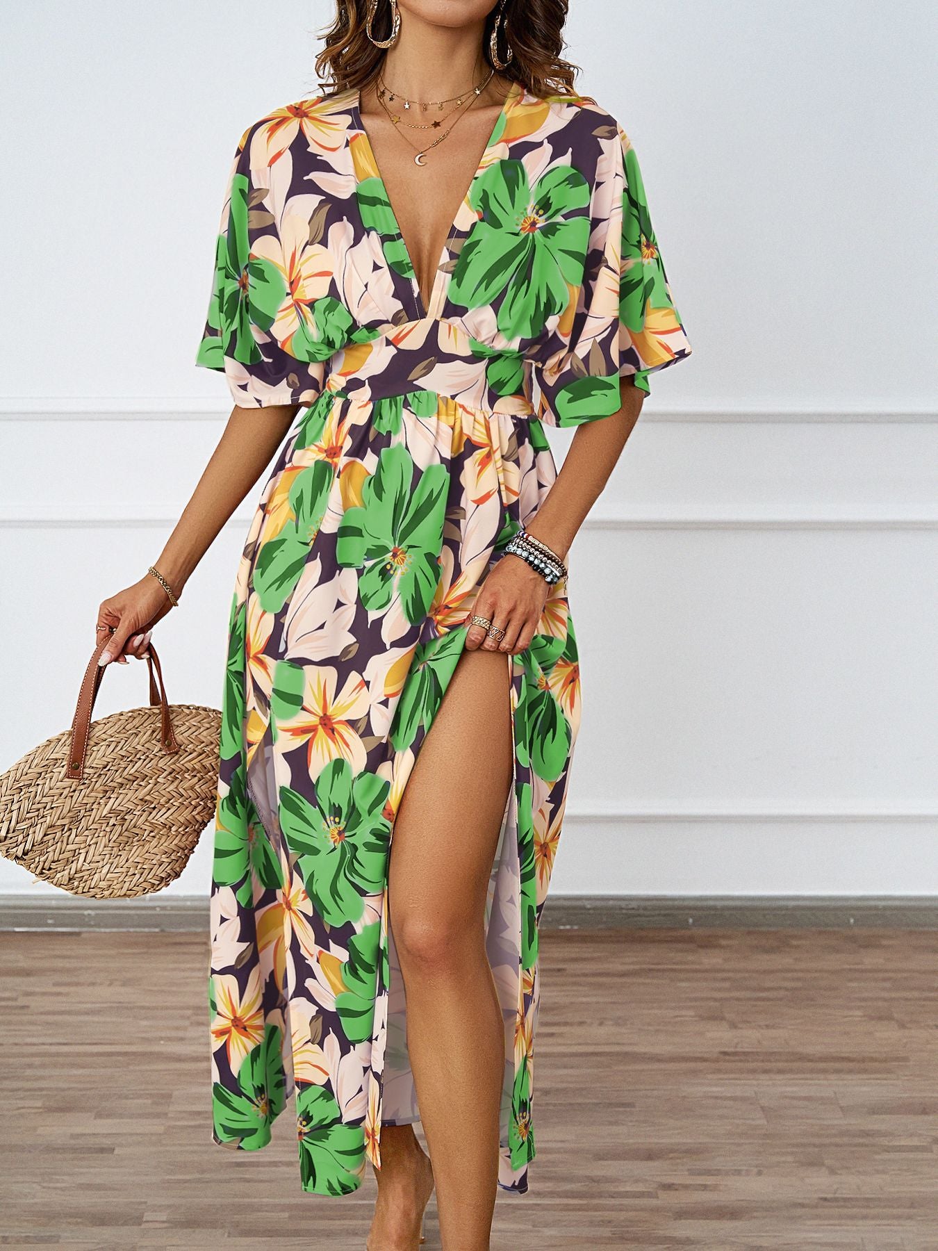 Damen florales Maxikleid mit tiefem V-Ausschnitt und Seitenschlitzen Sovae