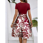 Damen Midi-Kleid mit floralem Design und tailliertem Schnitt Sovae