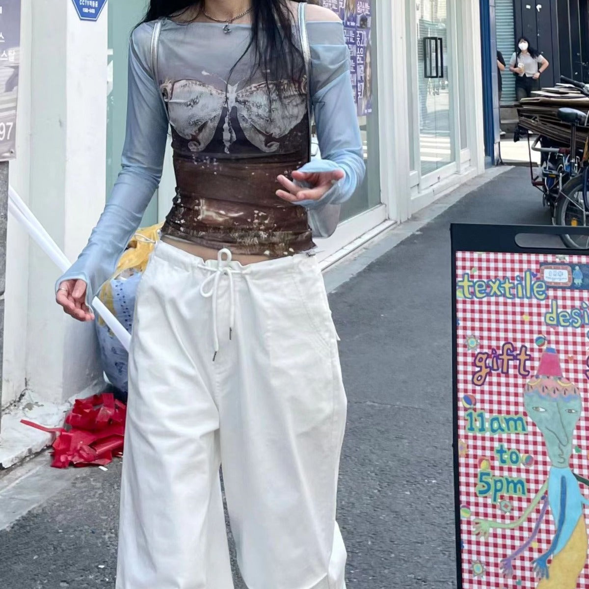 Damen Off-Shoulder Langarmshirt mit kreativem Druck Sovae