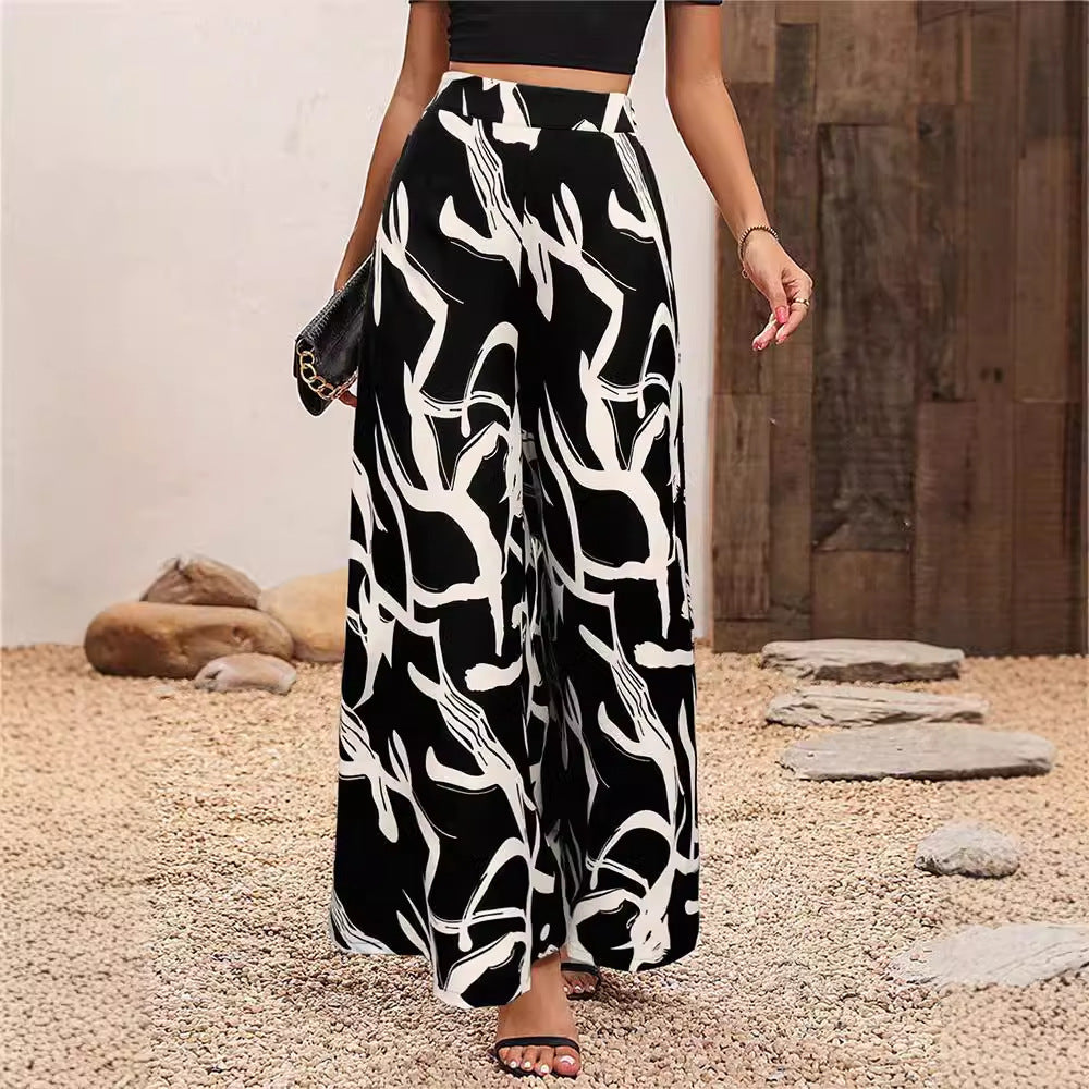 Damen Weit geschnittene Palazzo-Hose mit floralem Muster Sovae