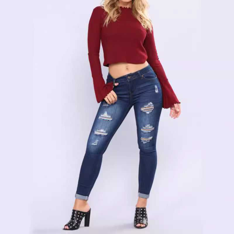 Damen Skinny Jeans mit modischen Rissdetails Sovae
