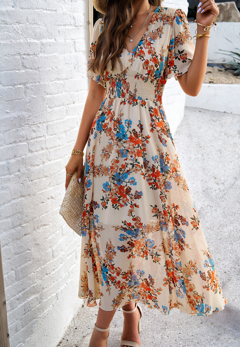 Damen Midi-Kleid mit floralen Akzenten und elastischem Tailleneinsatz Sovae