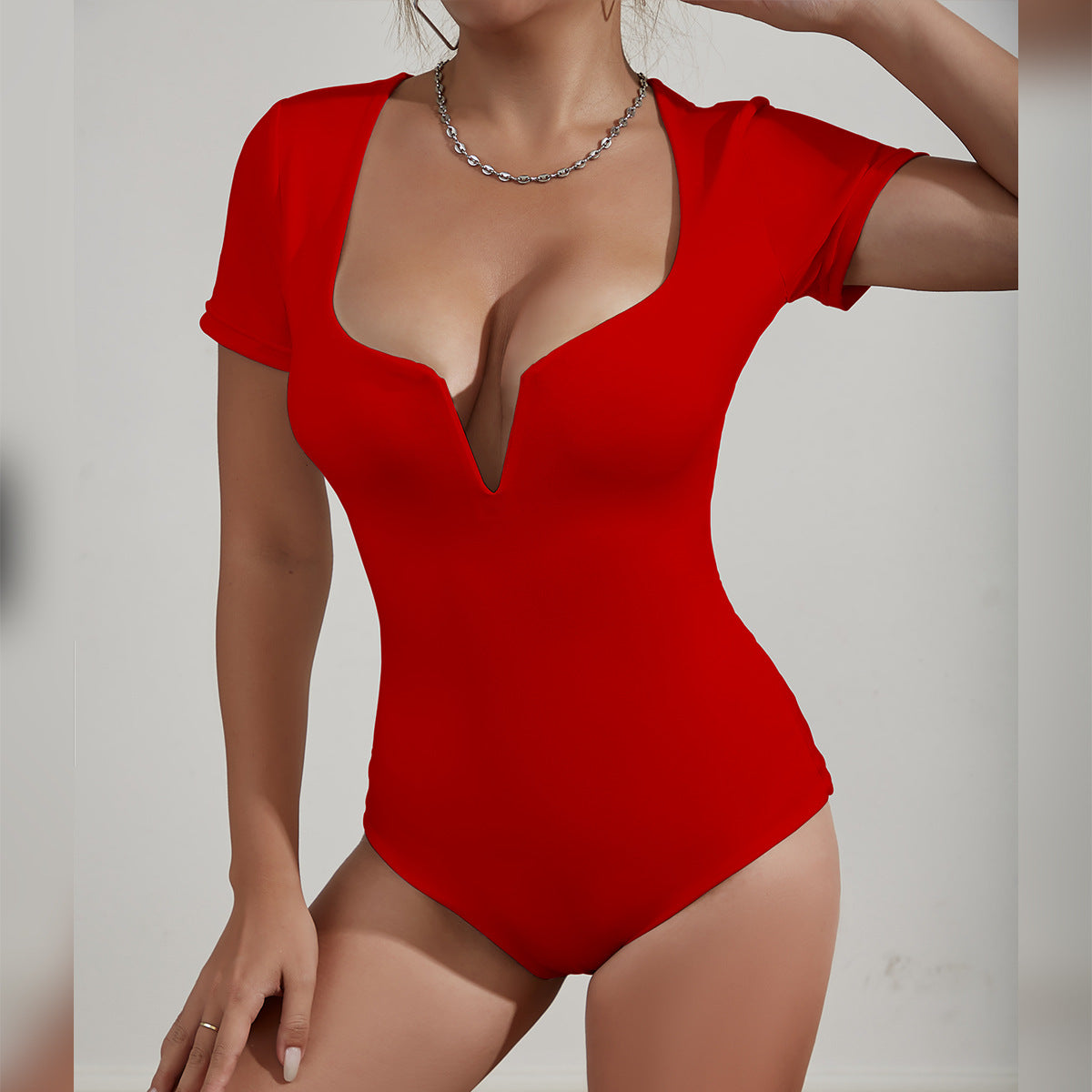 Damen Bodysuit mit tiefem V-Ausschnitt und kurzen Ärmeln Sovae