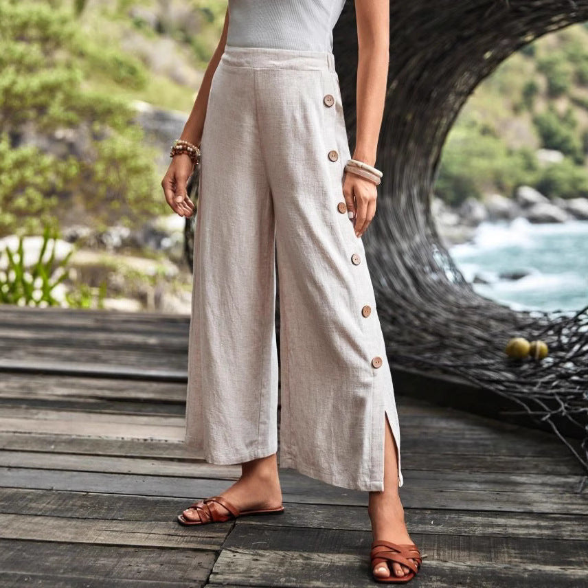 Damen Weit geschnittene Leinenhose mit Knopfdetail und seitlichen Schlitzen Sovae