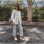 Damen leichte Bluse mit floralem Muster und dekorativem Bindegürtel Sovae