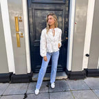 Damen Bluse mit floralen Stickereien und Rüschendetails Sovae