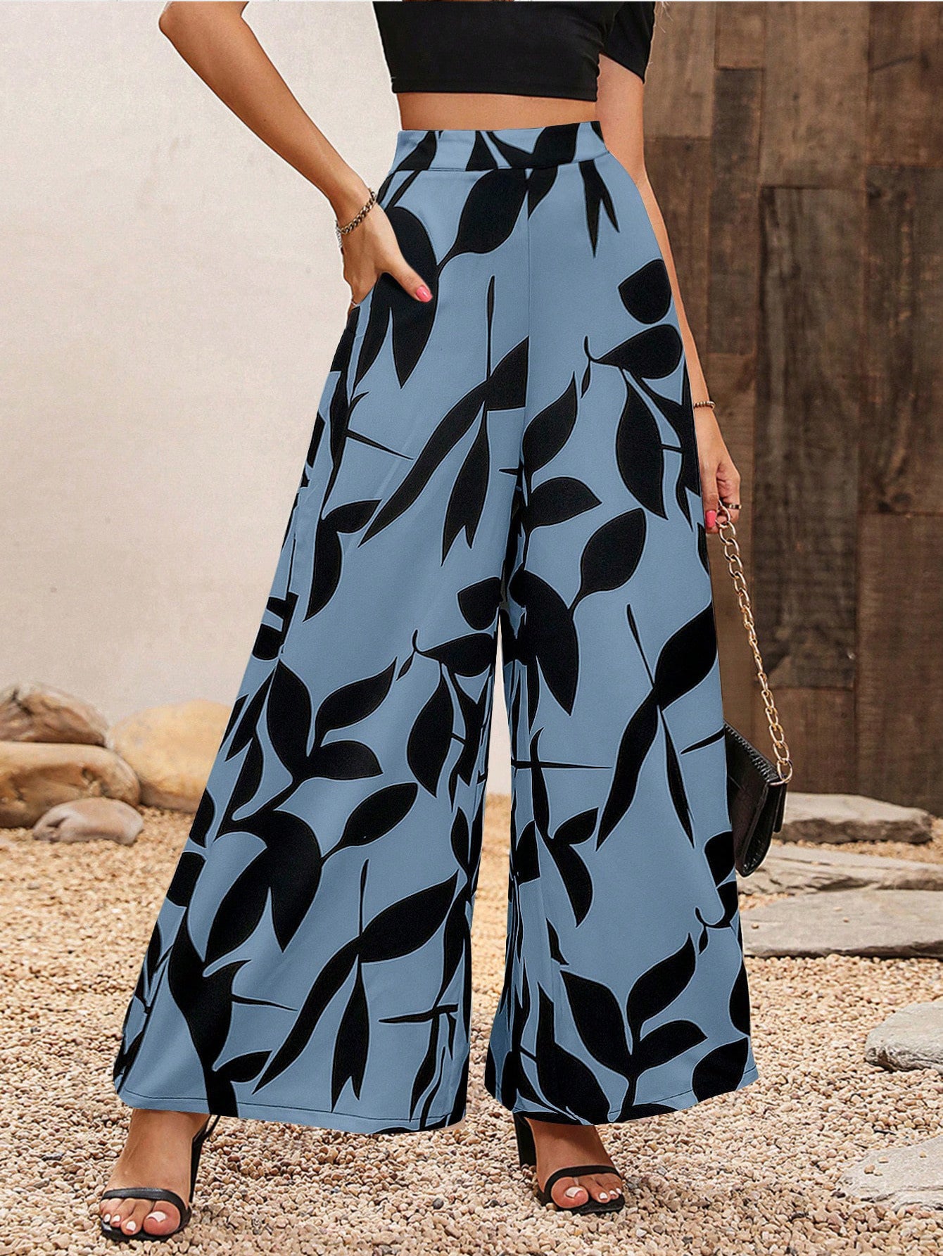 Damen Weit geschnittene Palazzo-Hose mit floralem Muster Sovae