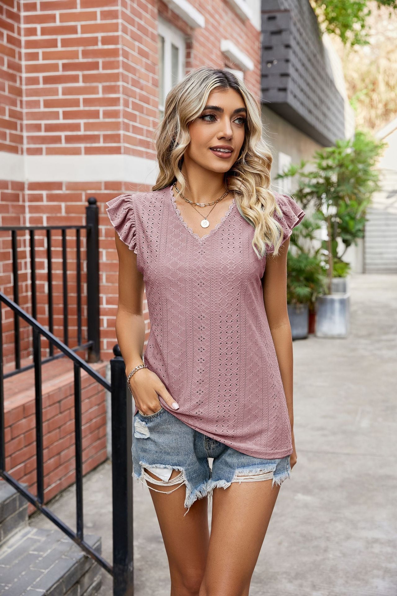Damen Elegantes Freizeitoberteil mit verspielten Rüschendetails Sovae