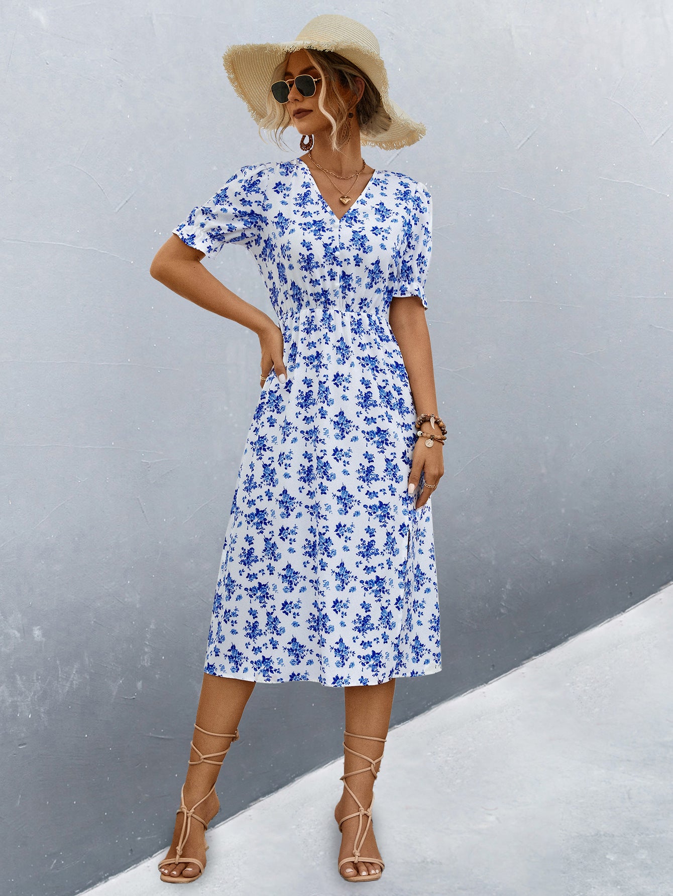 Damen midi Kleid mit floralen Mustern und seitlichem Schlitz Sovae