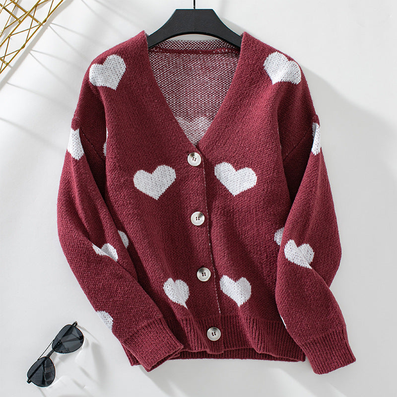 Damen modische Strickjacke mit Herzmotiven und Knöpfen Sovae