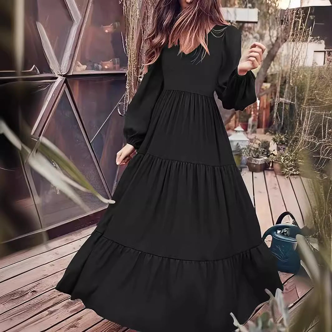 Damen fließendes Maxikleid mit V-Ausschnitt und eleganten Puffärmeln Sovae