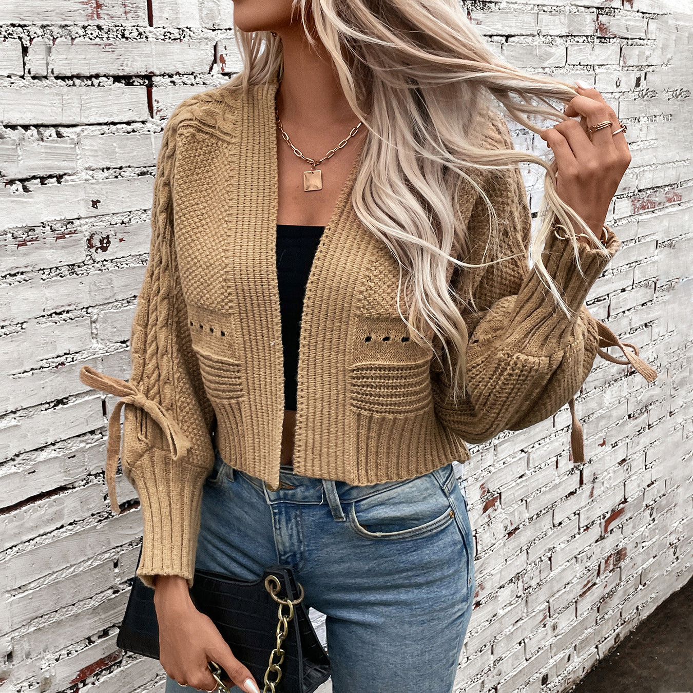 Damen modische Strickjacke mit voluminösen Ärmeln und Zopfmuster Sovae
