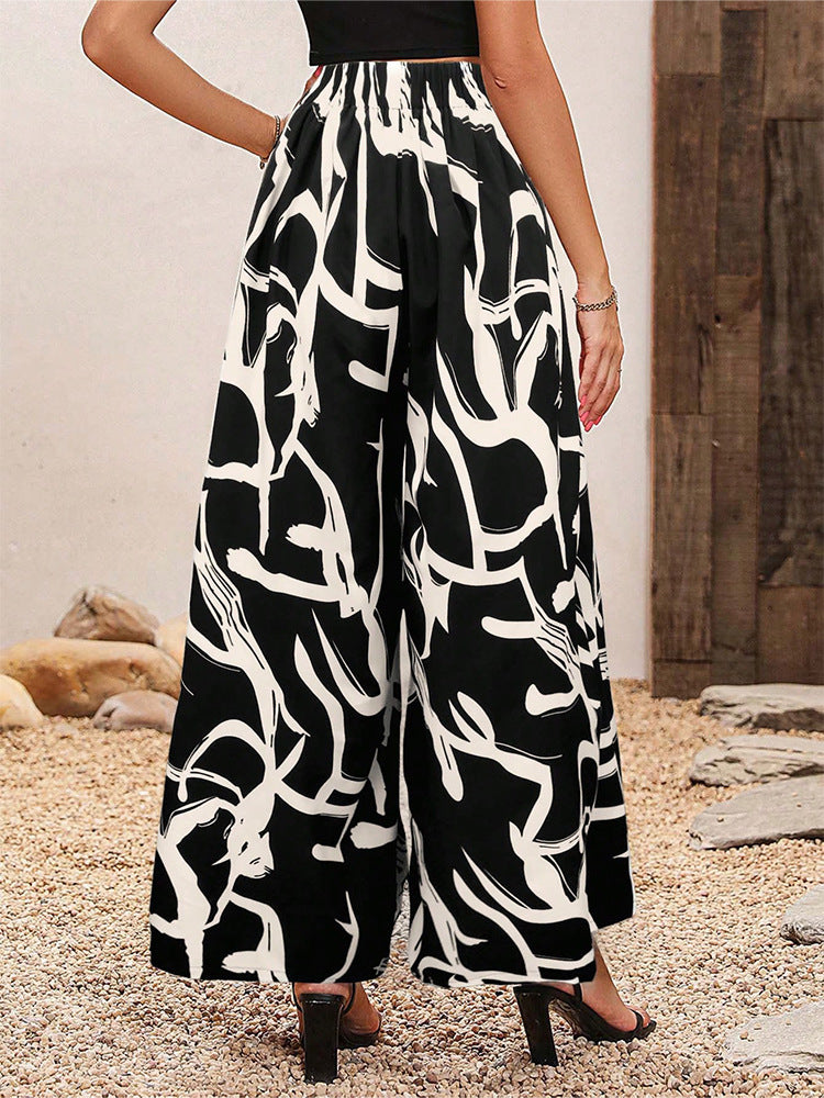 Damen Weit geschnittene Palazzo-Hose mit floralem Muster Sovae