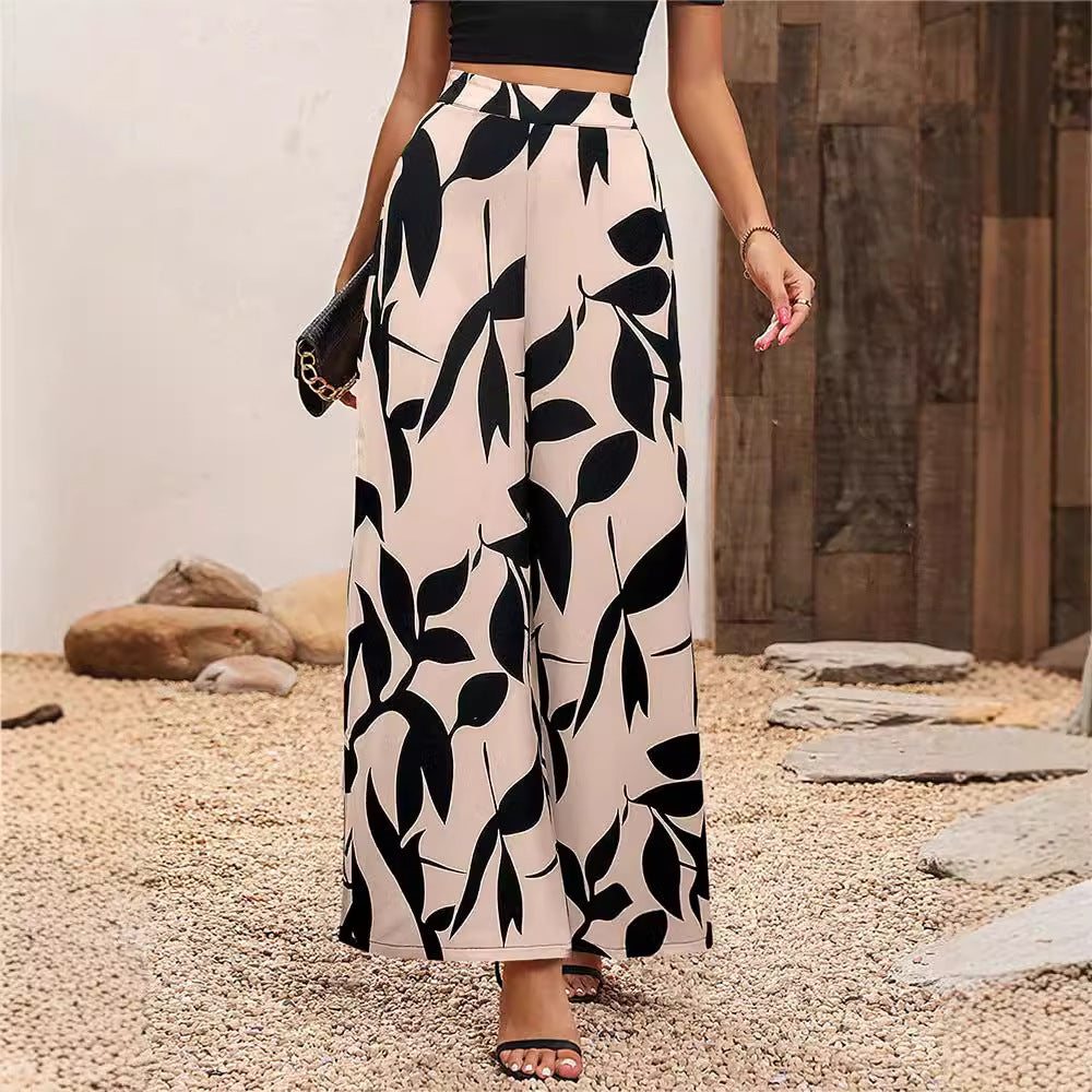 Damen Weit geschnittene Palazzo-Hose mit floralem Muster Sovae