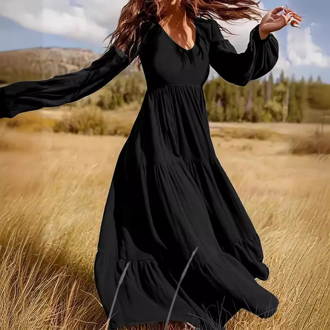 Damen fließendes Maxikleid mit V-Ausschnitt und eleganten Puffärmeln Sovae