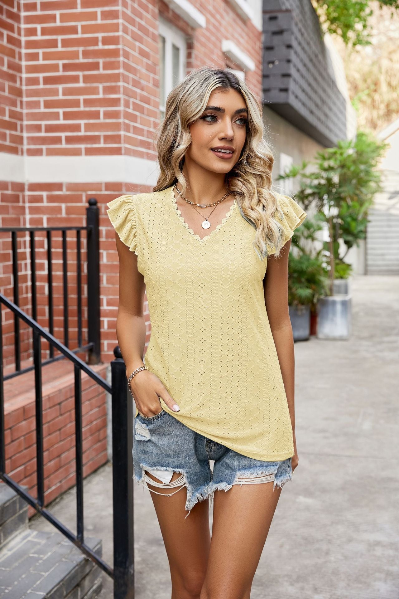 Damen Elegantes Freizeitoberteil mit verspielten Rüschendetails Sovae