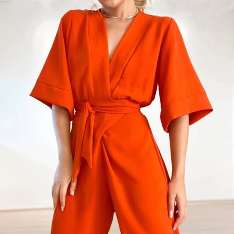 Damen eleganter Jumpsuit mit tiefem V-Ausschnitt und Taillenbindung Sovae