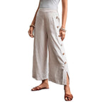 Damen Weit geschnittene Leinenhose mit Knopfdetail und seitlichen Schlitzen Sovae
