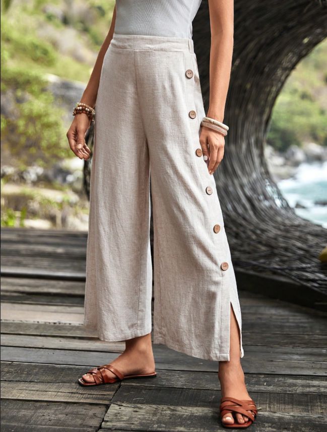 Damen Weit geschnittene Leinenhose mit Knopfdetail und seitlichen Schlitzen Sovae