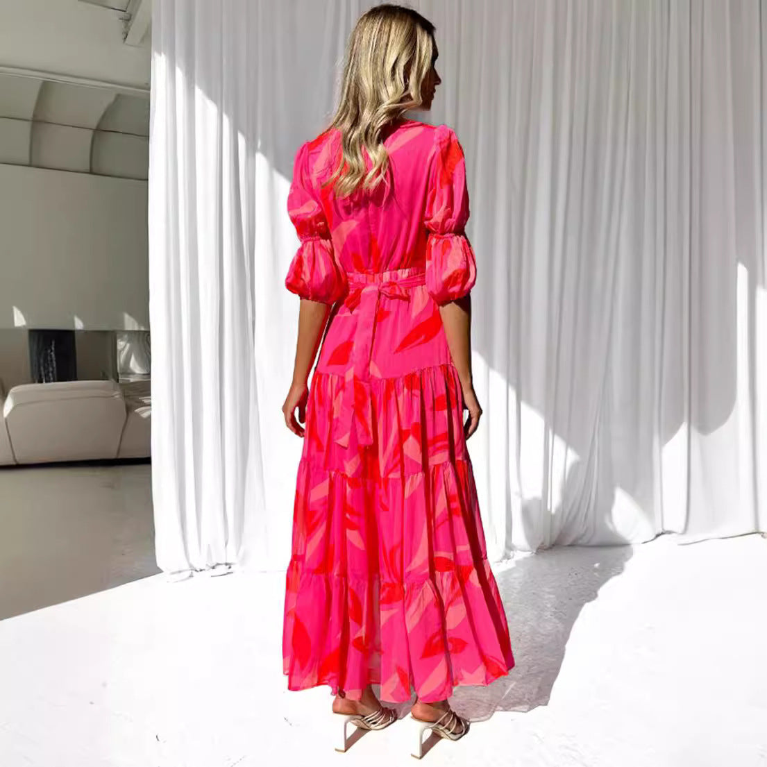 Damen Maxikleid mit voluminösen Ärmeln und floralen Details Sovae